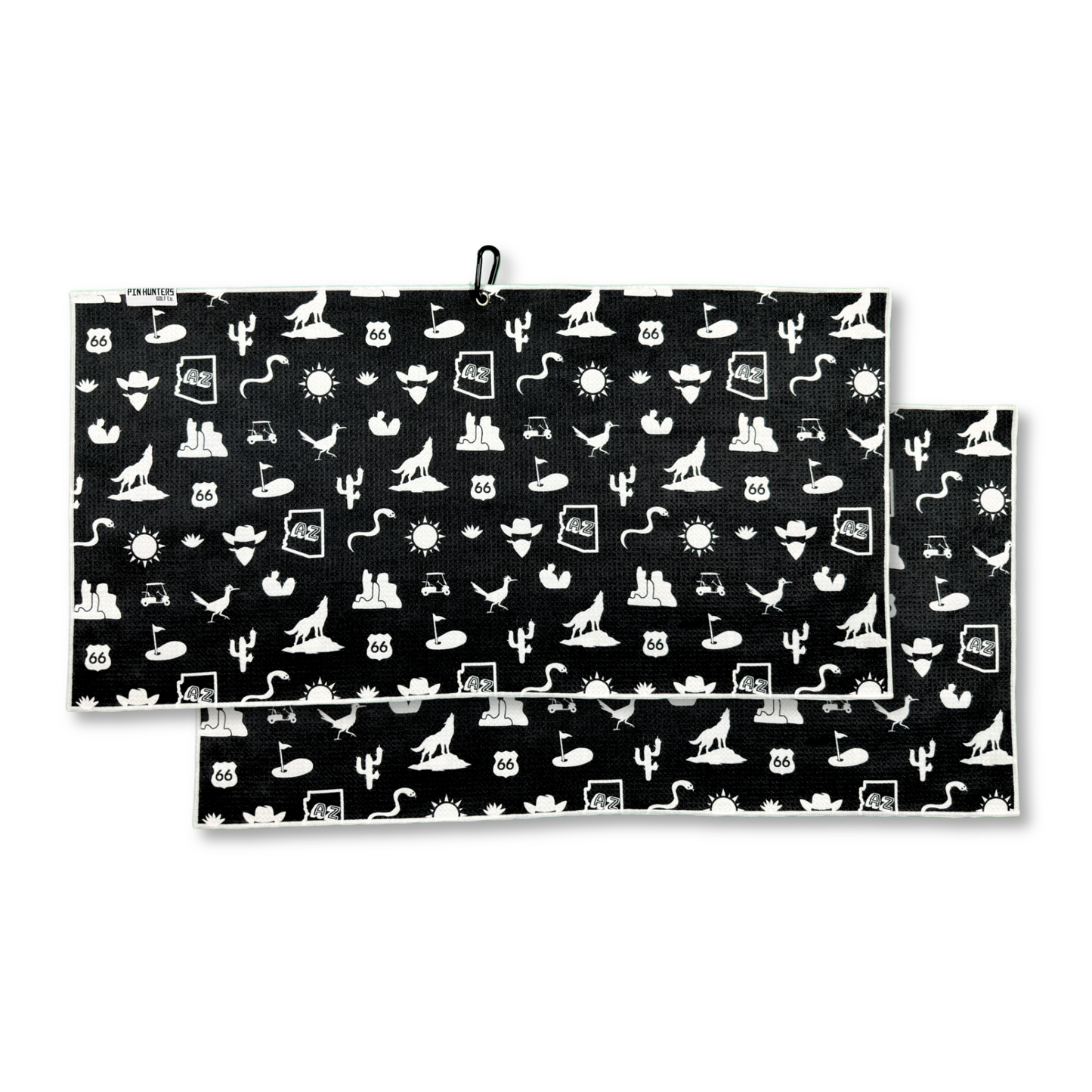 Black Arizona themed golf towel product image with white cactus, desert, road sign, sun, golf cart, golfer, and golf flag icons.