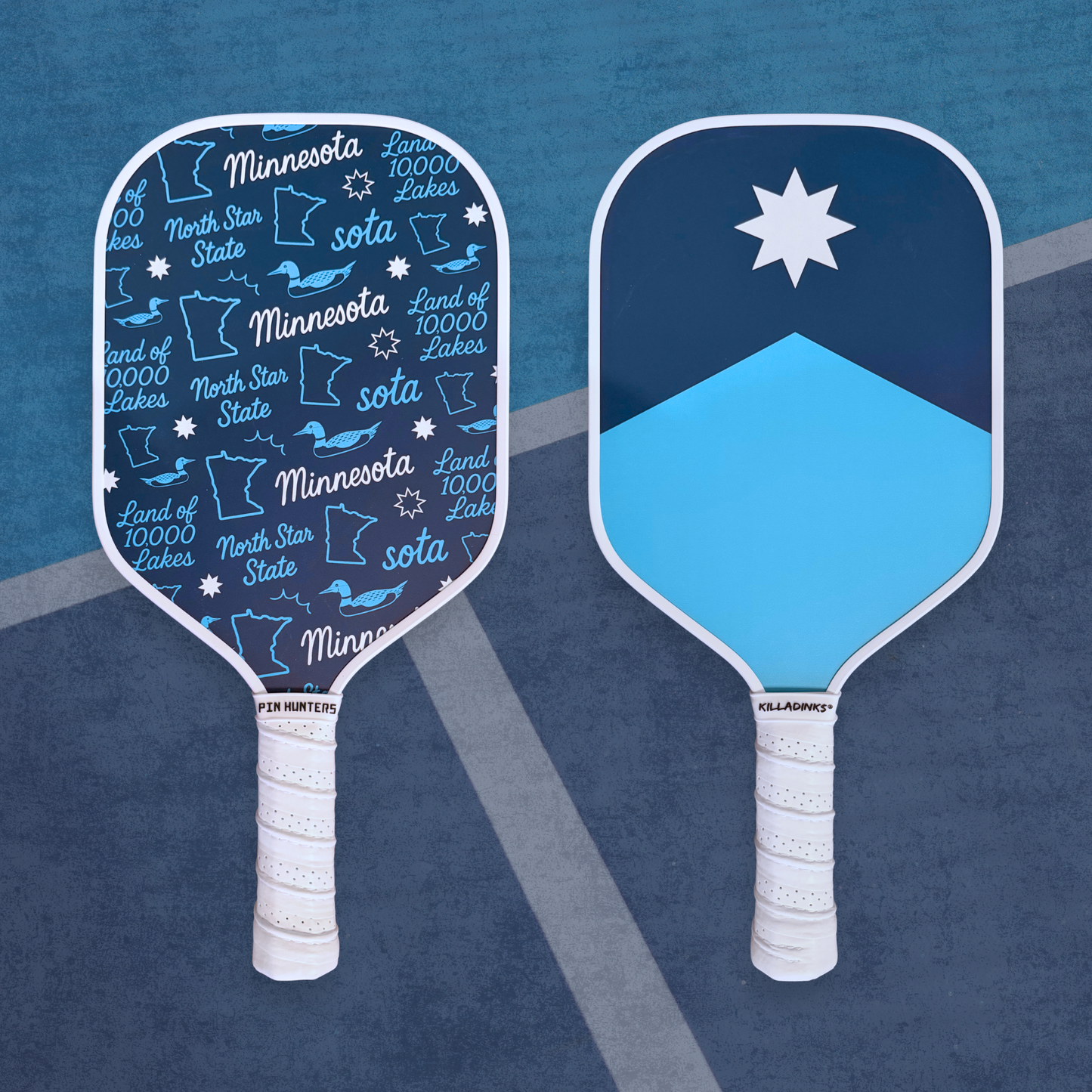 Blue Minnesota pickleball paddle set with state-themed pattern on one paddle, north star design on the other, and white grips on a court background.
