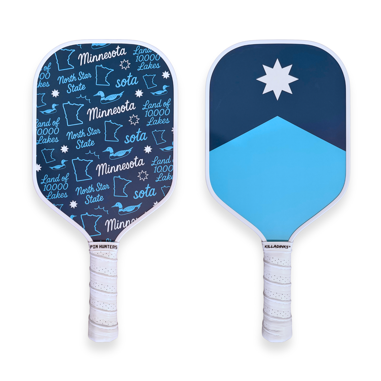 Blue Minnesota pickleball paddle set with state-themed pattern on one paddle, minimalist north star design on the other, and white grips.