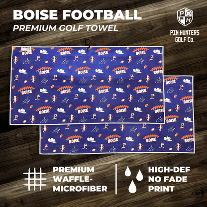 Boise State Broncos football premium golf towel graphic with stacked blue patterned towels, orange accents, and waffle microfiber callouts.