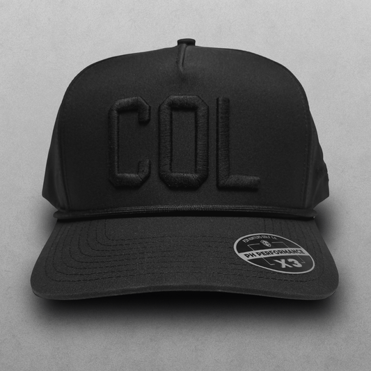 Blackout COL performance hat with tonal black raised embroidery, black rope detail, and PH Performance X3 sticker.