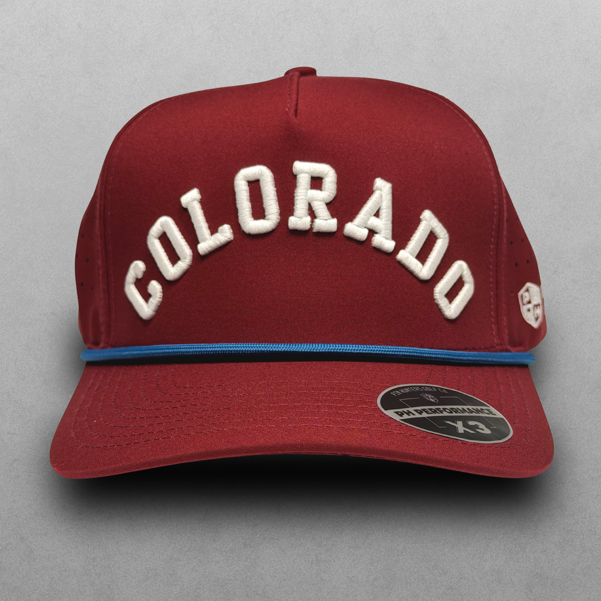 Colorado Avalanche performance hat with white raised arched embroidery, blue rope detail, side logo embroidery, and PH Performance X3 sticker.