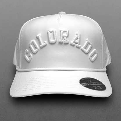 White Colorado performance hat with tonal white raised arched embroidery, white rope detail, perforated side panels, and PH Performance X3 sticker.