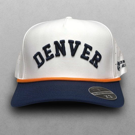 Denver Broncos inspired white performance hat with navy raised DEN embroidery, navy brim, orange rope detail, and PH Performance X3 sticker.