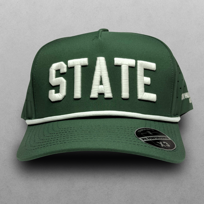 Michigan State Spartans inspired green STATE performance hat with white raised embroidery, white rope detail, and PH Performance X3 sticker.