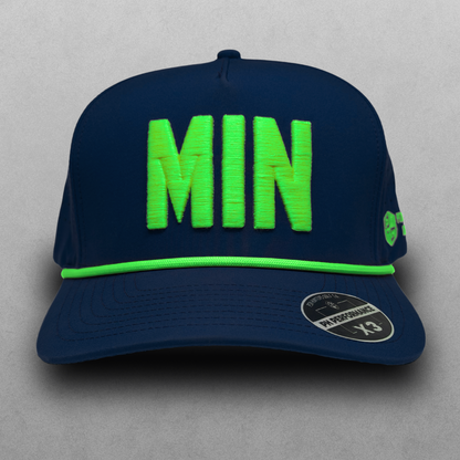 Navy MIN performance golf hat with neon lime raised MIN embroidery, matching lime rope, flat brim, and PH Performance X3 sticker.