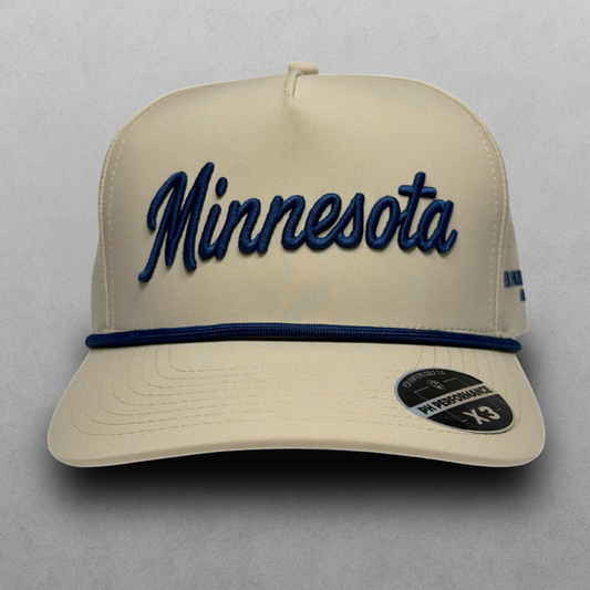 Studio front view of tan Minnesota script performance golf hat with navy embroidery, navy rope, flat brim, and PH Performance X3 sticker.