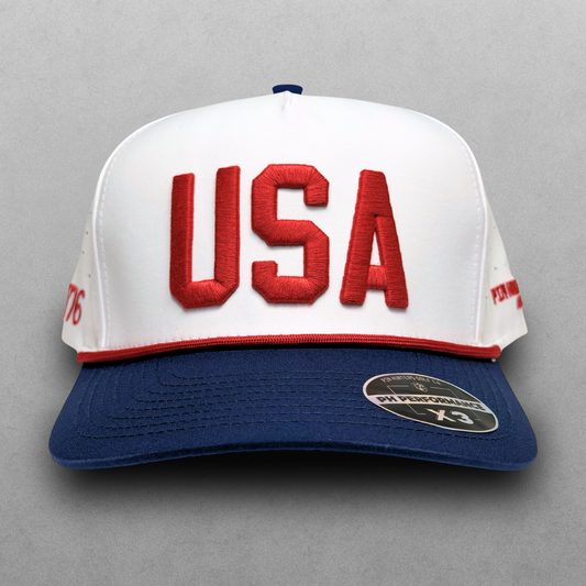 USA performance hat with red raised embroidery, white crown, navy brim, red rope detail, and PH Performance X3 sticker.