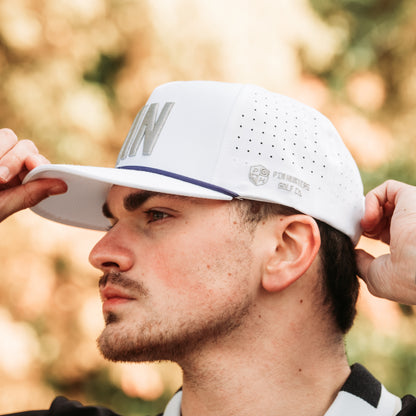 White MIN performance golf hat with gray embroidery, purple rope detail, side logo embroidery, and perforated side panels.