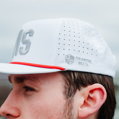 White WIS performance golf hat side detail with gray side logo embroidery, red rope, perforated panels, and raised front embroidery.